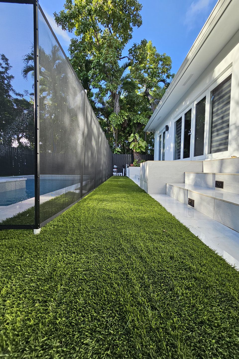 Synthentic grass around pool area