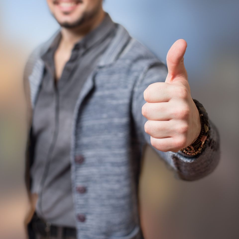 man giving a thumbs up