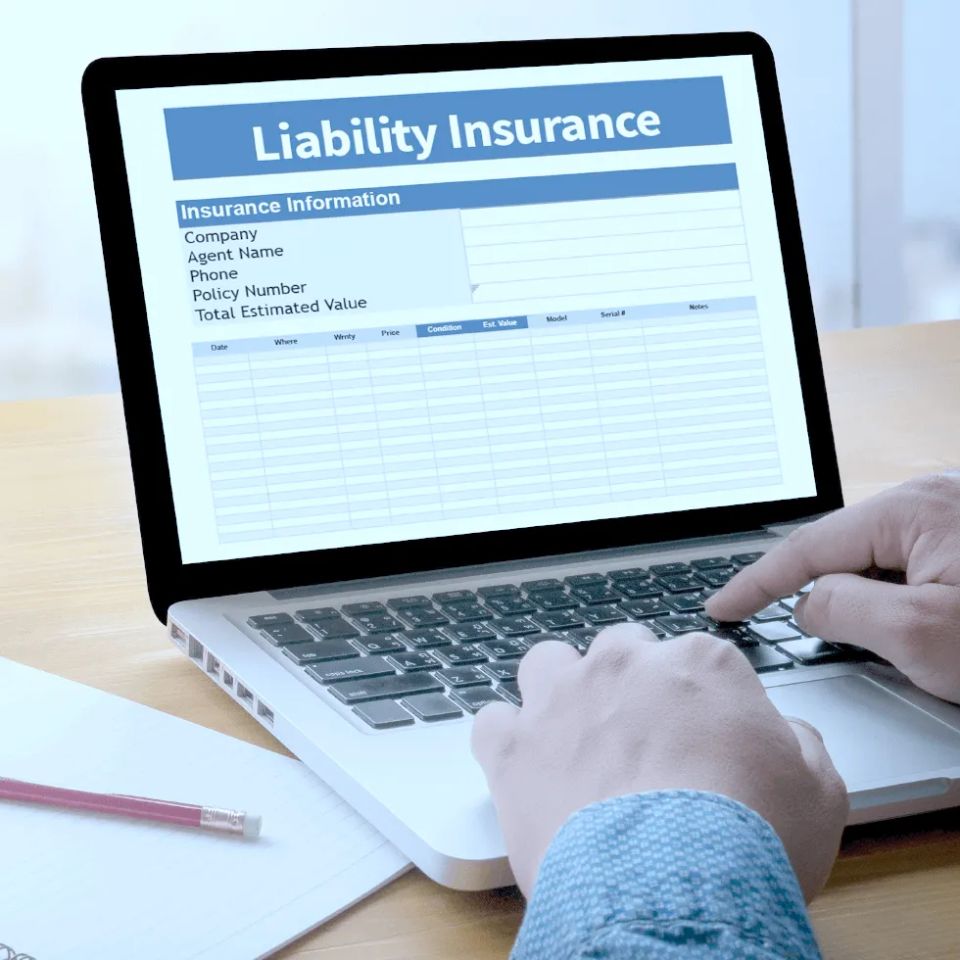 Employee viewing liability insurance policy online