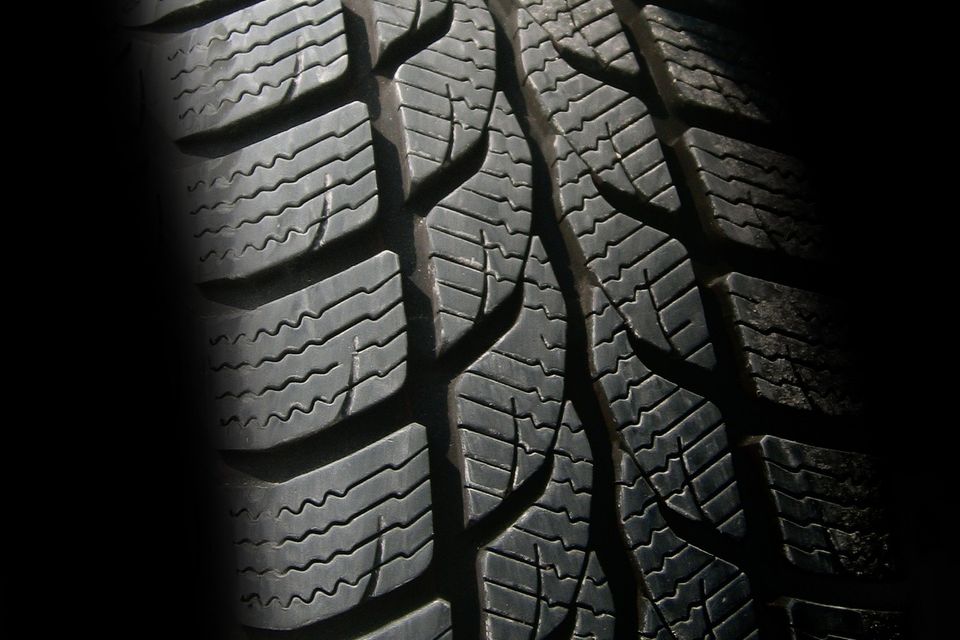 Image of a tire in natural light.