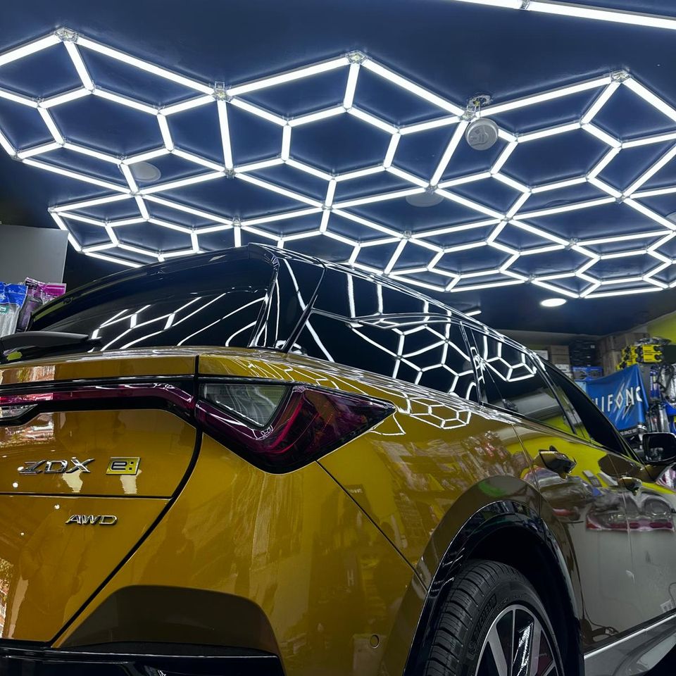 Yellow detailed Acura MDX SUV