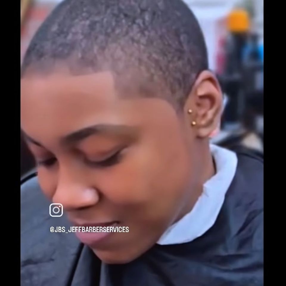 Close-up of female customer after a fresh fade haircut by Jeff Barber Services