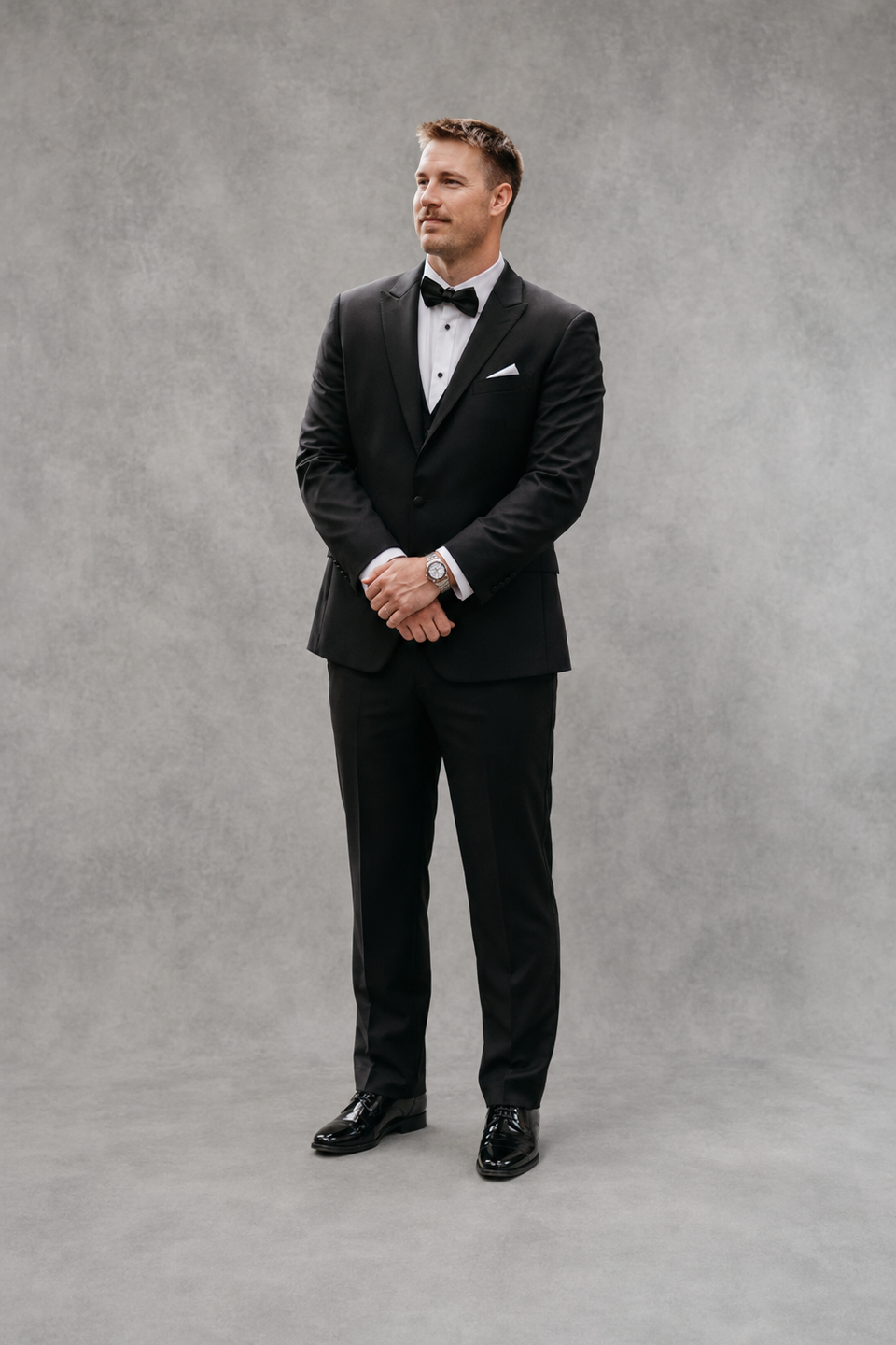 A groom wearing a sharp premium tuxedo rental from Alma's Bridal boutique in Placer County