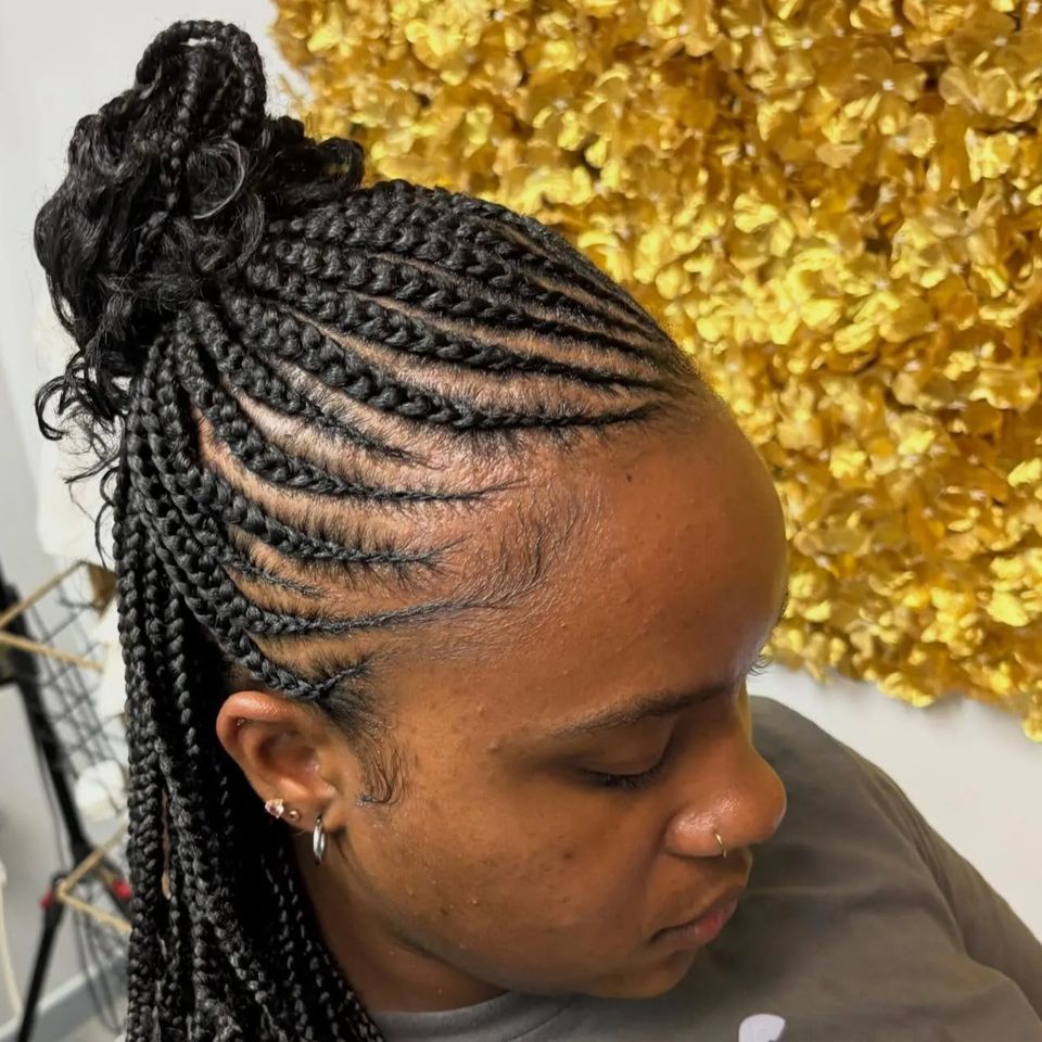 Feed in cornrows into a curly braided ponytail after a braiding service in Los Angeles CA
