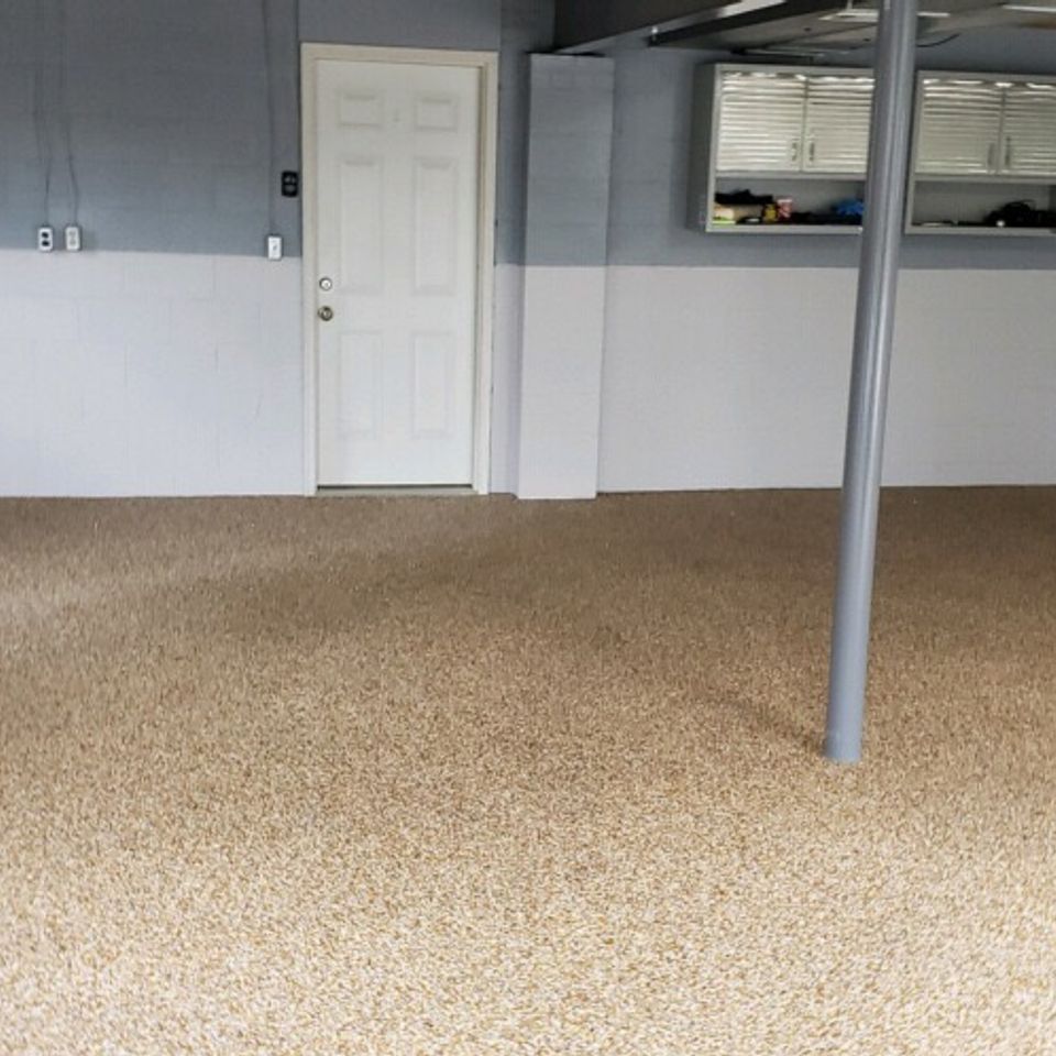 Large garage featuring an EverStone decorative stone flooring system with a seamless finish.