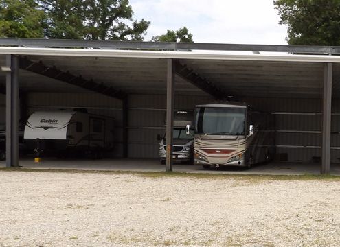covered storage is 11 feet wide by 45 feet deep and a 13 foot clearance