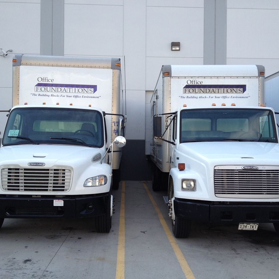 Office Foundations moving trucks