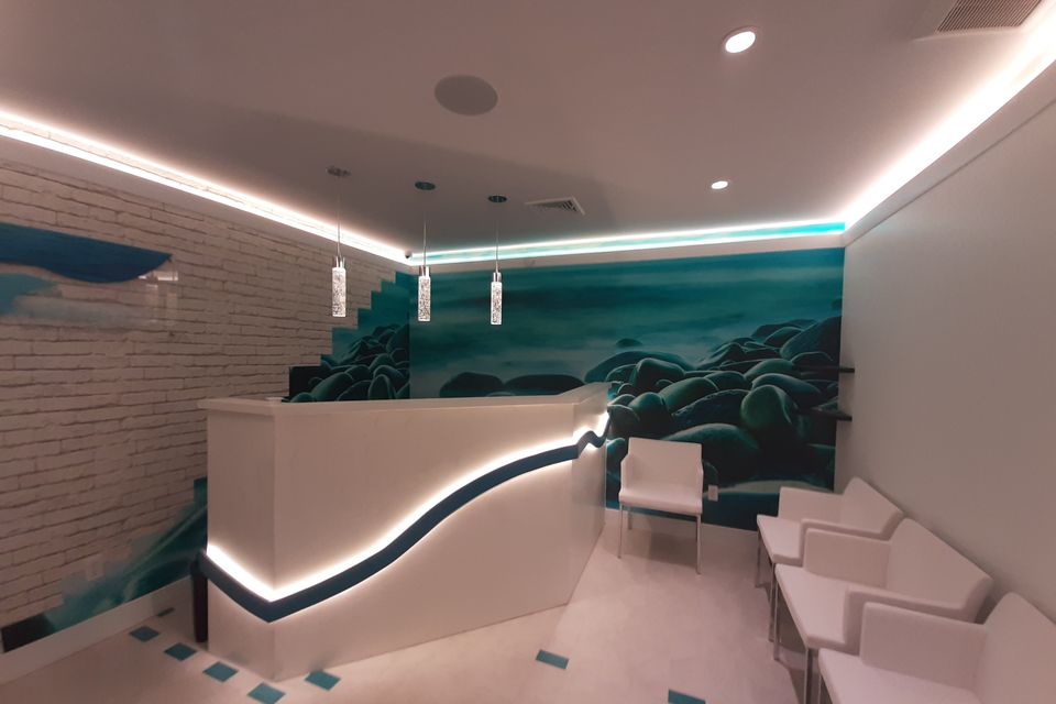 Luxurious medical office waiting area with contemporary interior design.