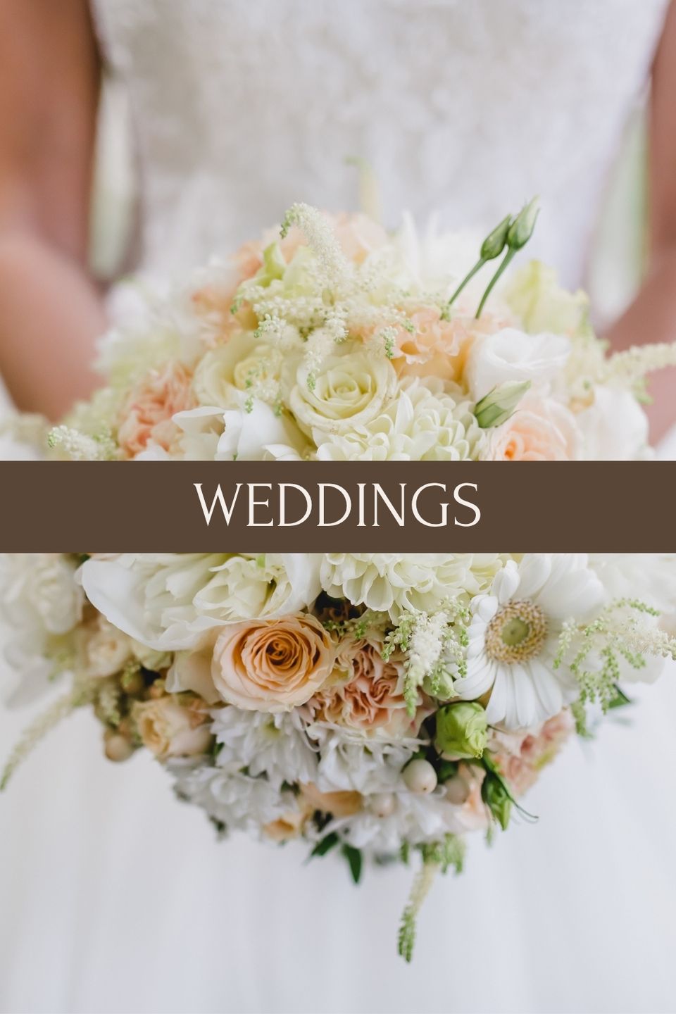 bridal bouquet with soft neutral florals at farm chic wedding venue in North Carolina