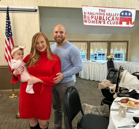 Logan holding faustina and al cutrona