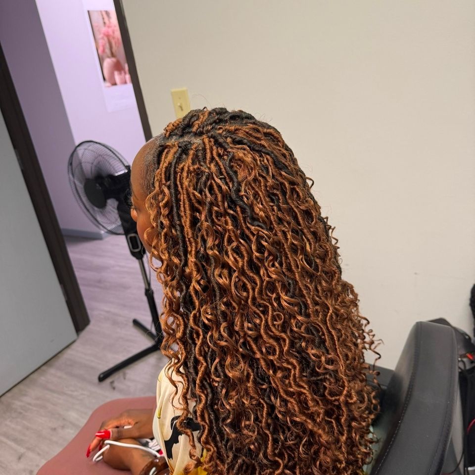 Crochet braids, done by Amazing African Hair Braiding By Ruthy in Los Angeles CA