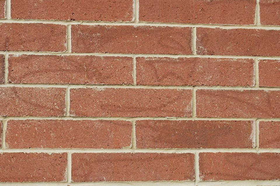 laser cleaning concrete and brick surfaces to remove grime and stains