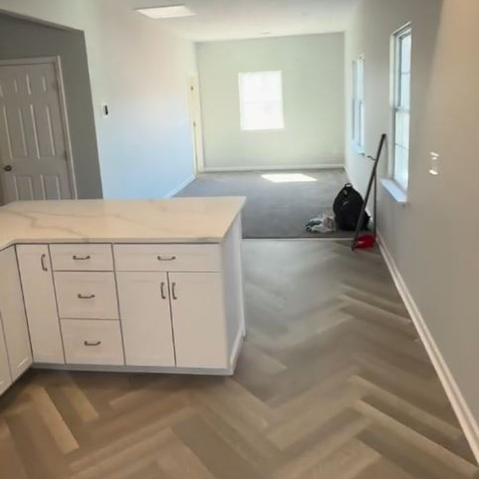 Herringbone tile flooring install in progress by general contractor in Suffolk County NY