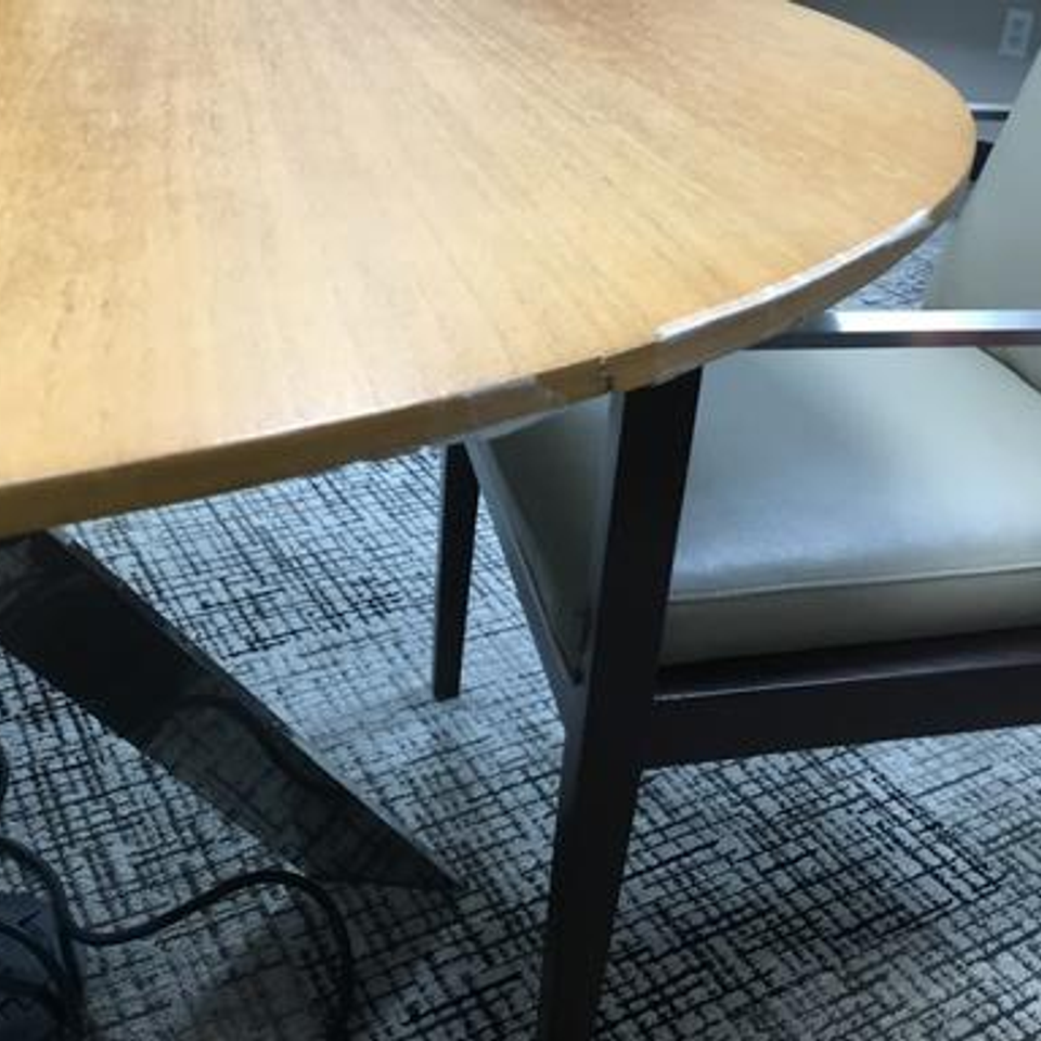 round table with the edging ripped off
