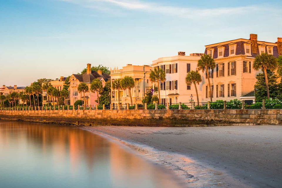Sunset glow on historic homes lining the Charleston Battery seawall
