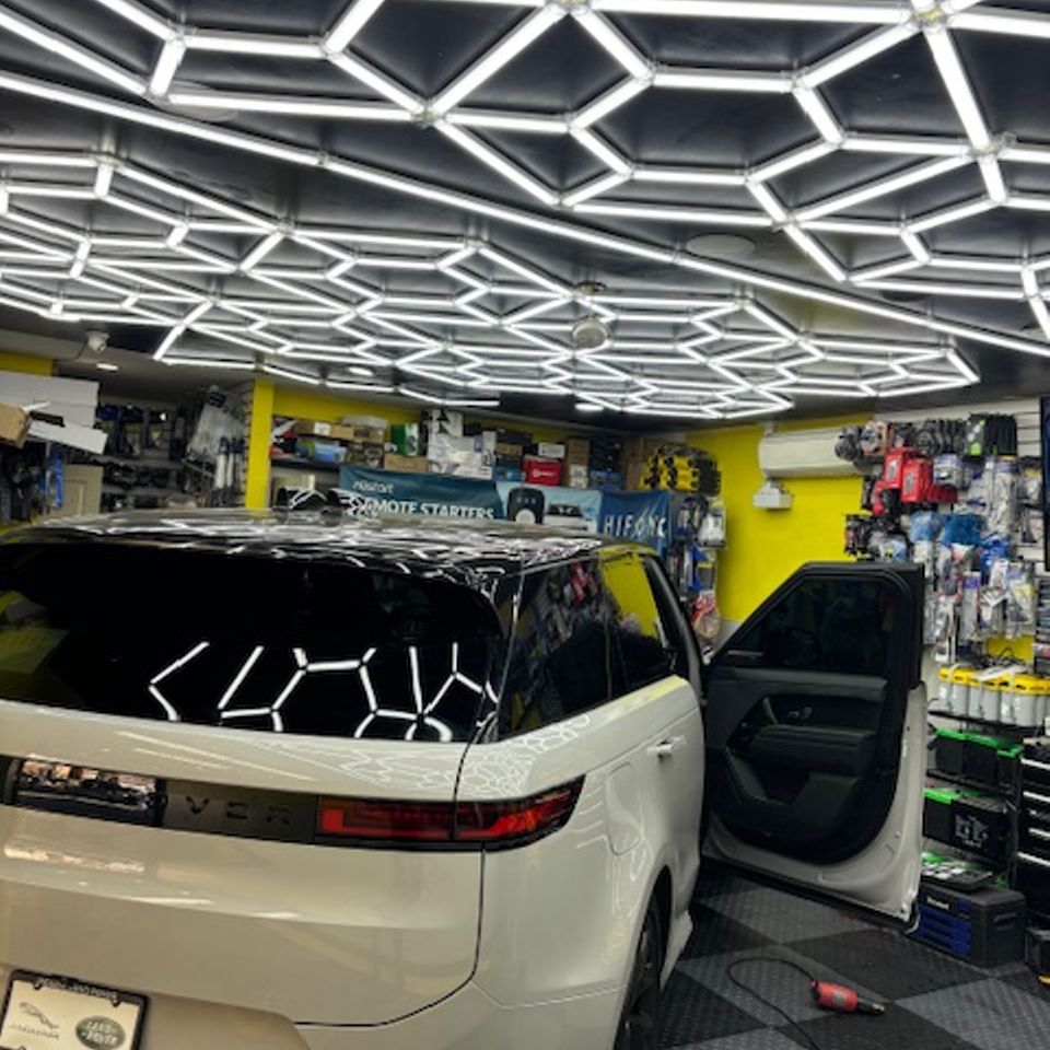 Window tints on white Land Rover SUV