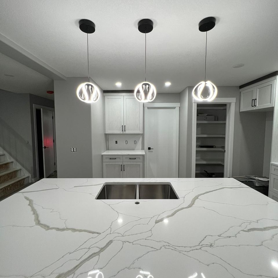 Middle countertop with three stylish lights