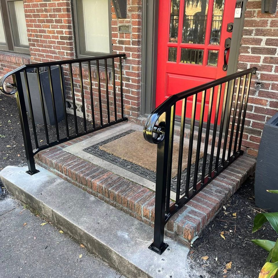 Welded black iron handrails for residential porch installed in Houston