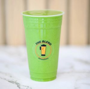 Spinach Blast smoothie with almond milk, pineapple, mango, spinach, agave, and protein powder.