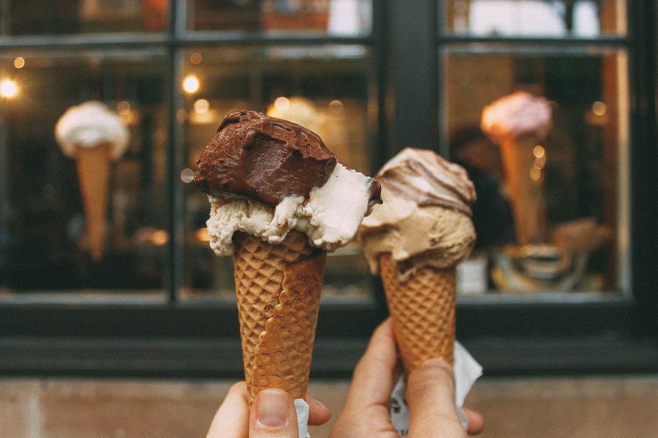 Two different ice cream cones and flavors