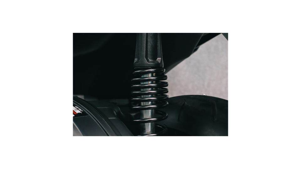 Image of a automotive shock with a progressive spring.