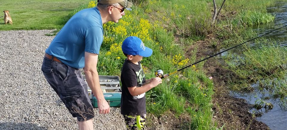 Grandpa and grandson fishing