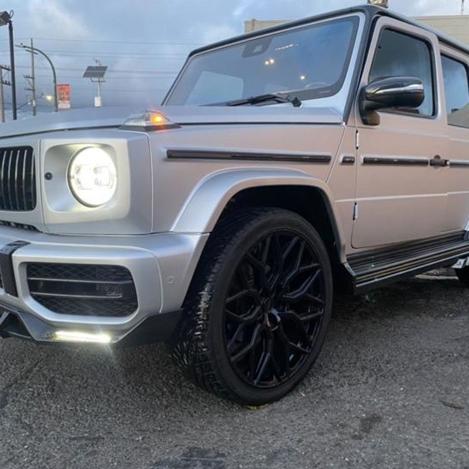 Grey Mercedes Off-Road Rover in a Gallery Photo