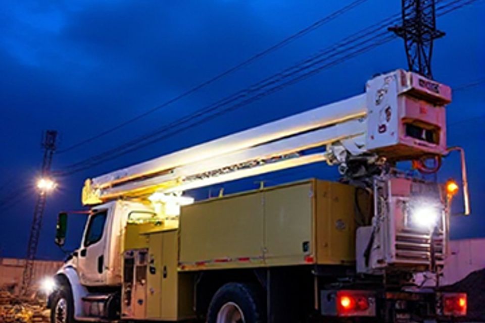Boom truck nighttime condensed