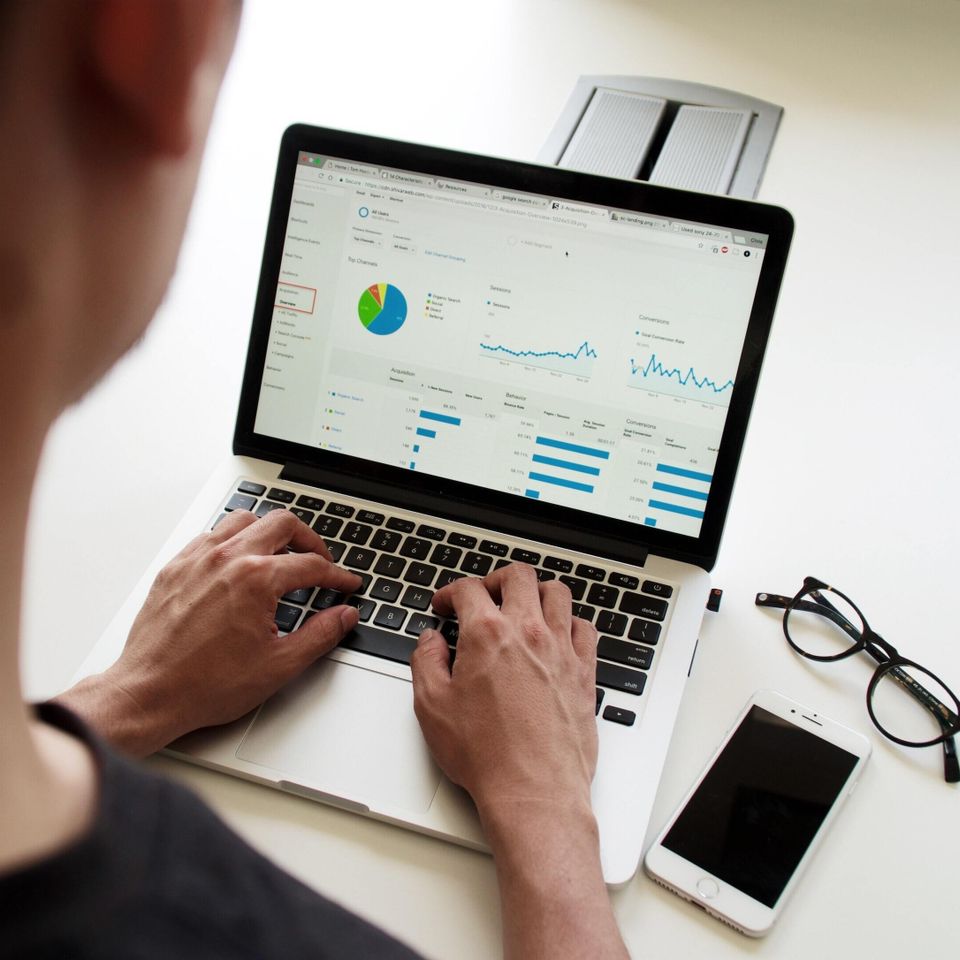 Charts and graphs on laptop