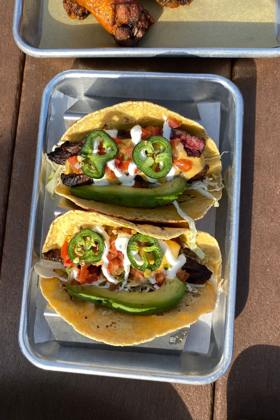 Hawk photo tacos and wings
