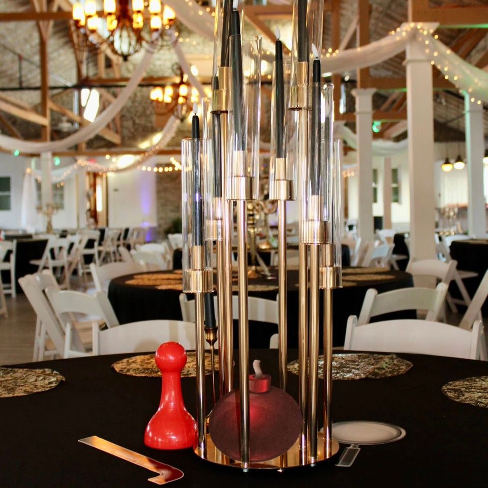 Tall candle centerpieces   palace of riverbend 