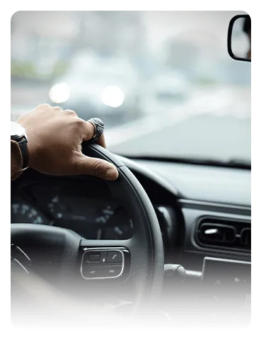 Hand on car steering  wheel