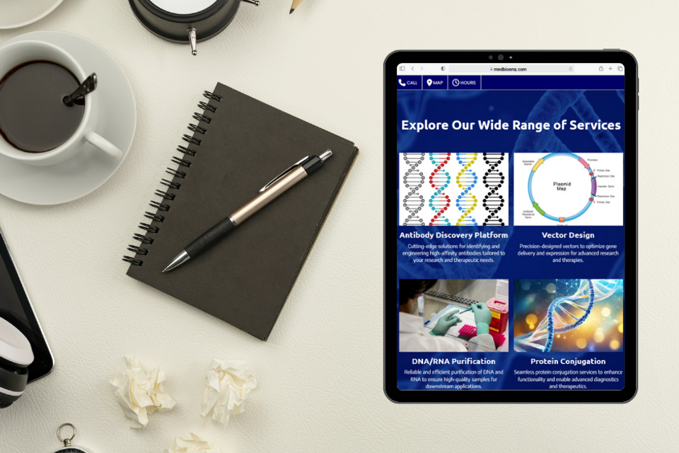 Tablet displaying Medical Biotechnology Engineering services page at FITCI in Frederick Maryland with visuals for antibody discovery, vector design, and RNA purification.