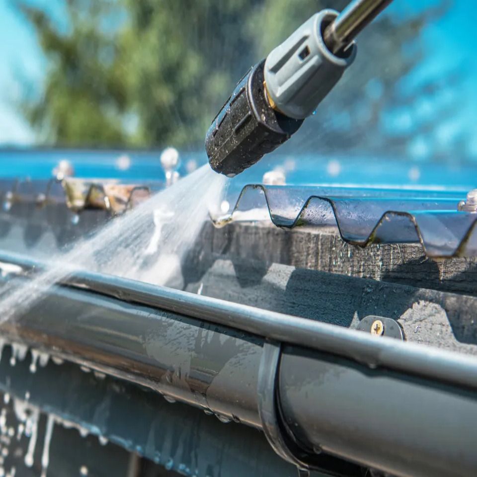 Pressure washing a roof