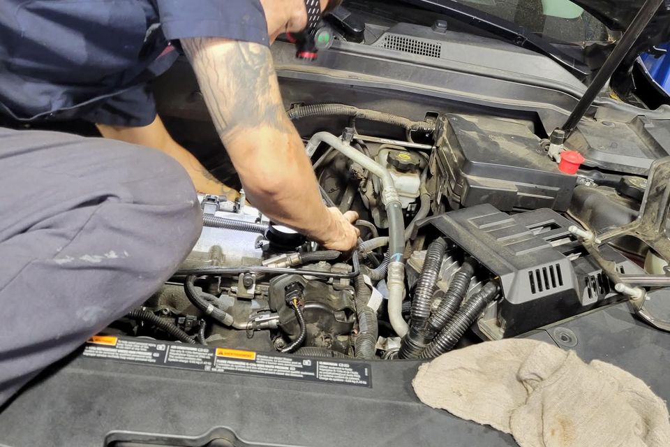 Miguel at elite auto tech changing a heater core