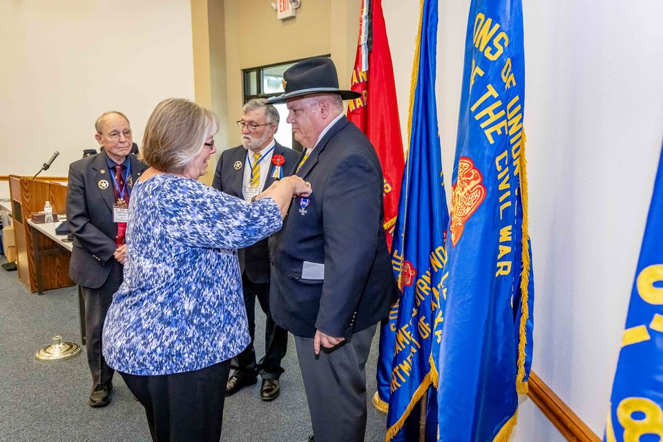 73   mrs. vander meulen pins badge on dc elect vander meulen