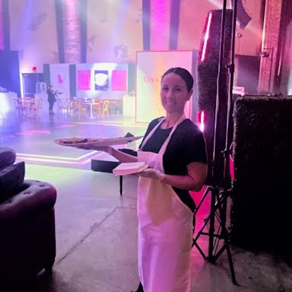 The Party Savers Waitress & Bartender Service serving Hors D'oeuvres