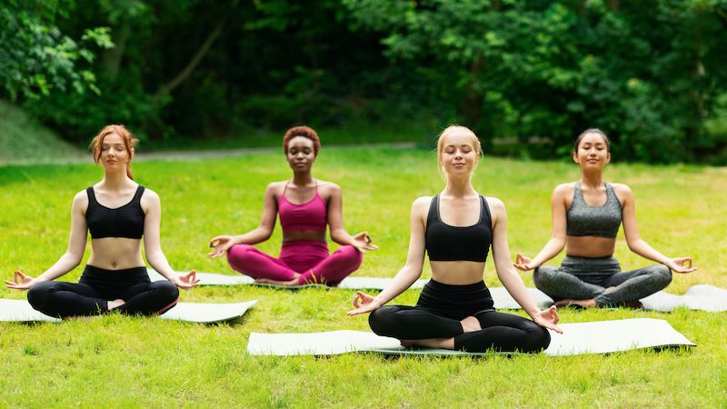 Outdoor yoga class group of diverse girls doing br 37lr7gr