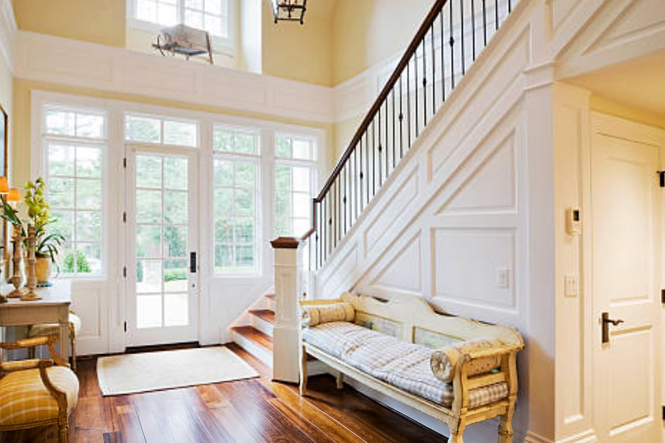 Grand entryway white staircase