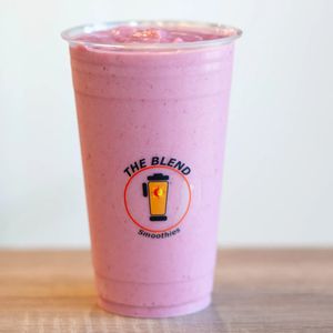 Strawberry Groove smoothie made with mixed berry juice, soy milk, strawberries, banana, and frozen yogurt.
