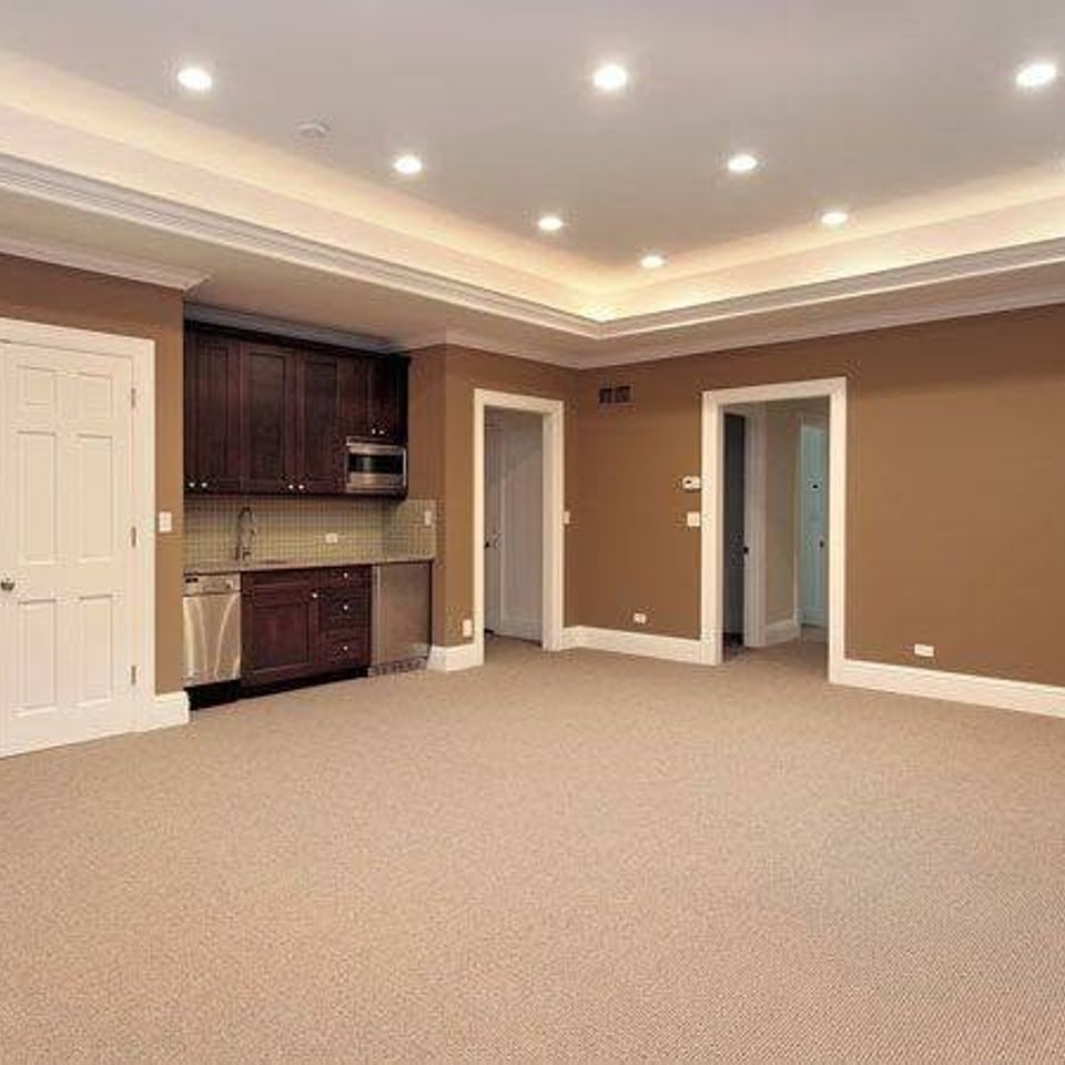 Finished basement carpet built in cabinets