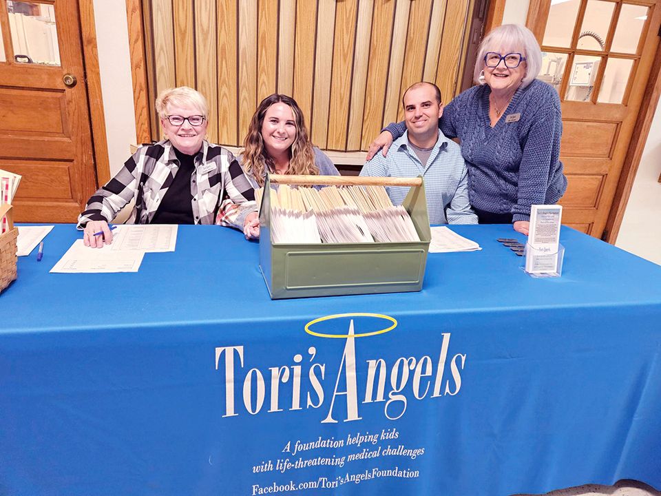 11 g23 jackie wicks  brooke and sam grett  mj brown welcome table
