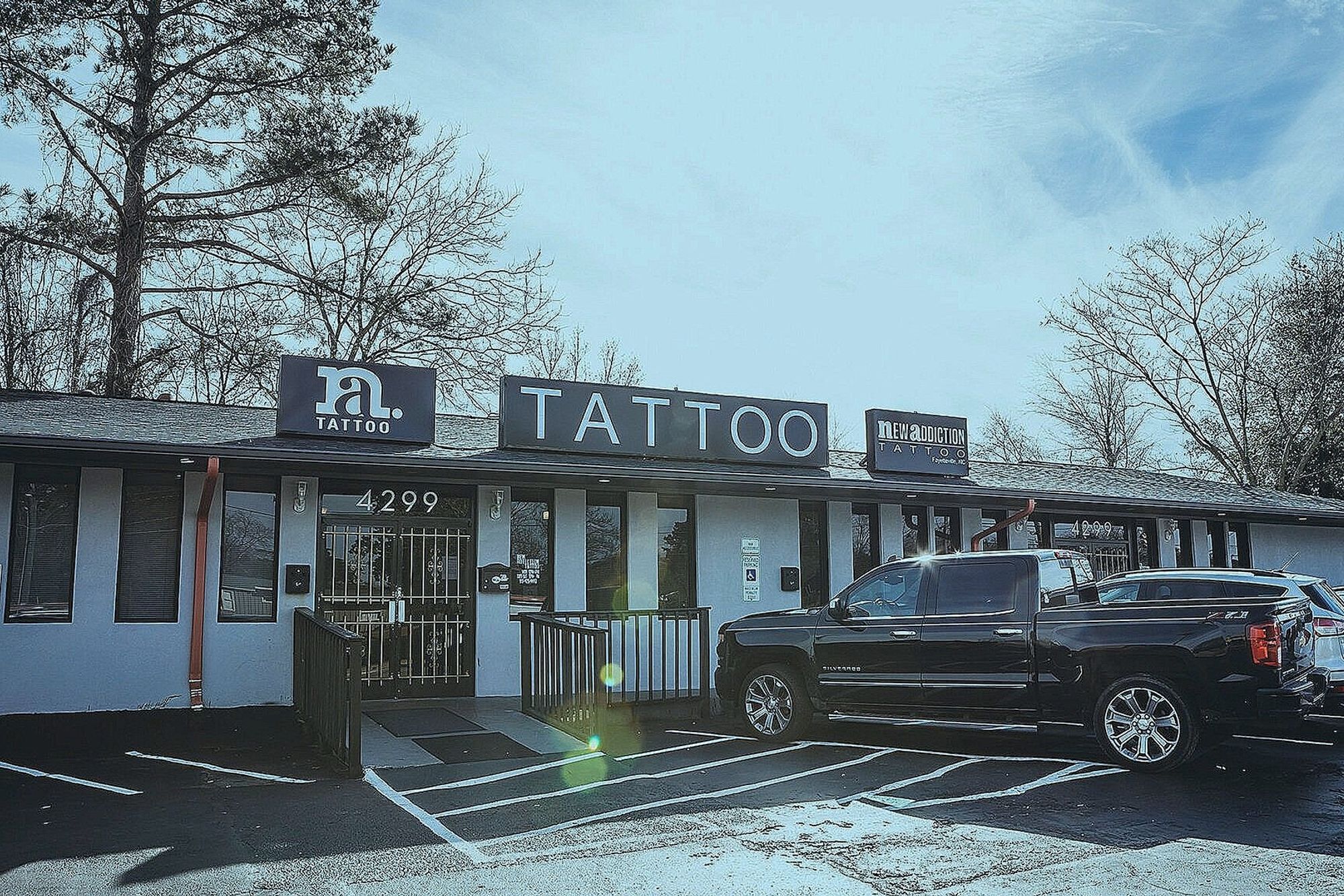 New Addiction Tattoo, tattoo and piercing in Fayetteville