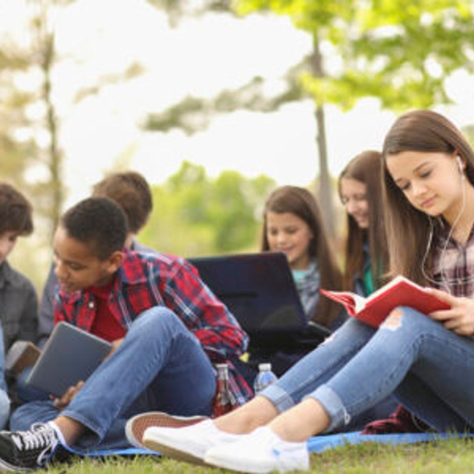 Teens in class outside