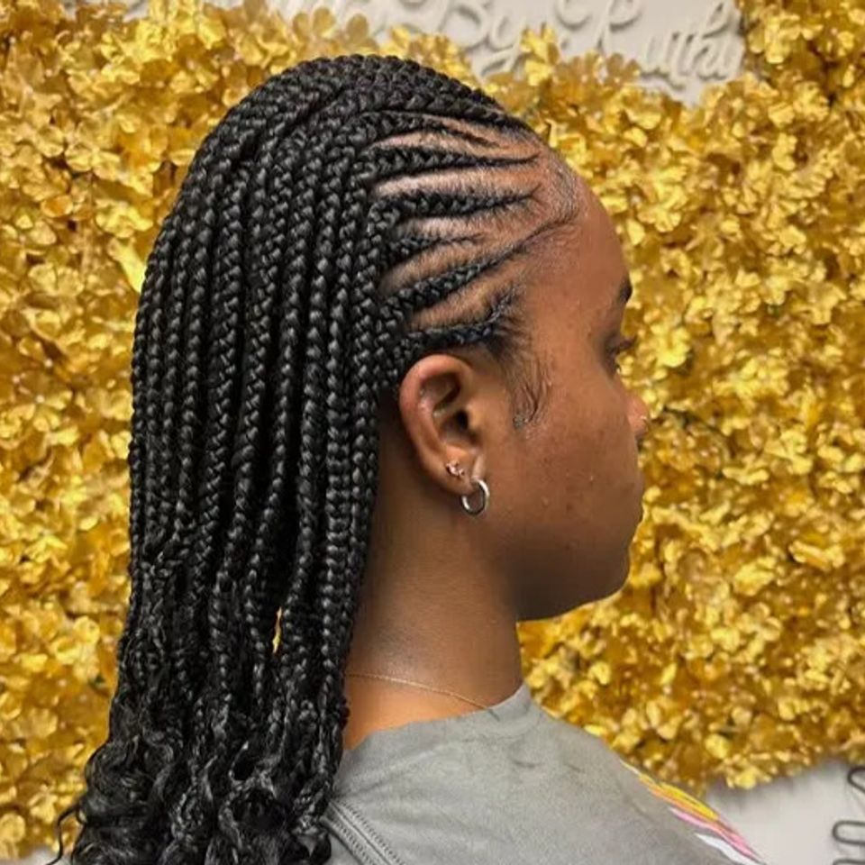 Fulani style cornrows into boho knotless braids with curly ends in Los Angeles CA