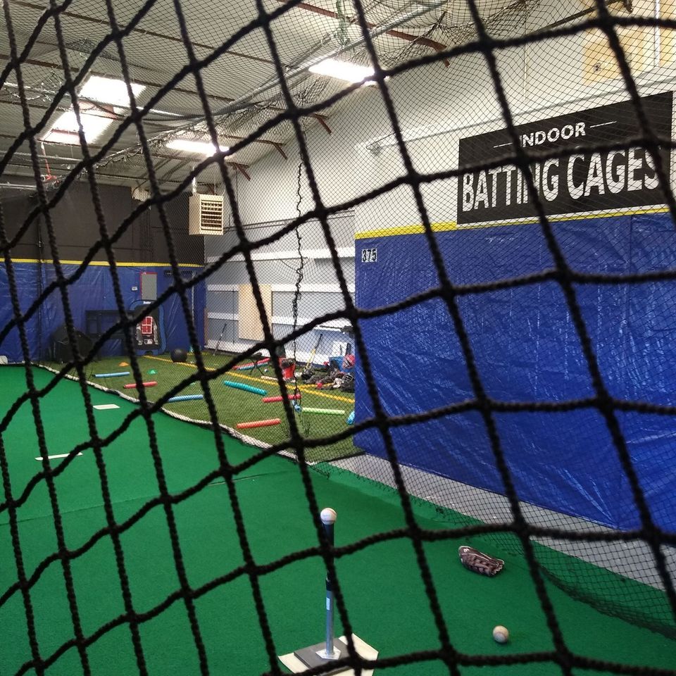 Indoor batting cage hitting cage