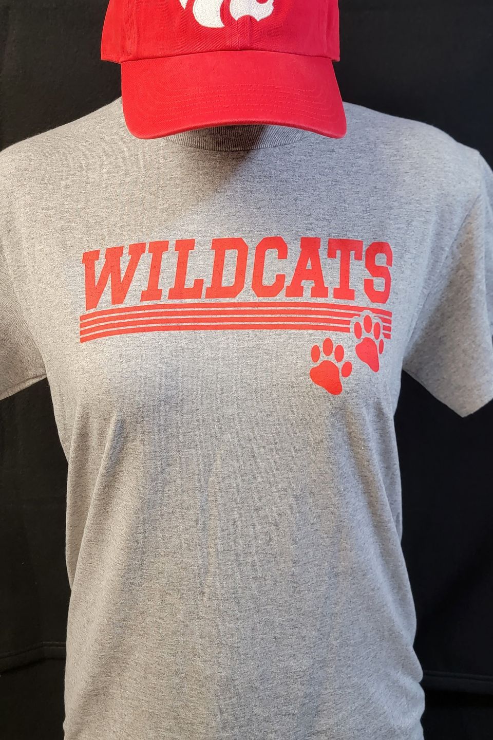 Example of Direct to Film (DTF) transfer - Wildcats logo on a gray t-shirt, embroidered & logo cap 