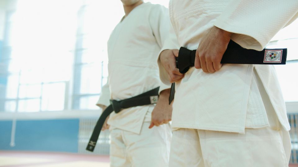 Stock photo of karate students used in a blog about karate at Takamine Karate Dojo in Miller Place