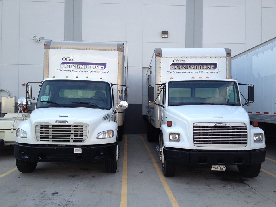 Office Foundations moving trucks