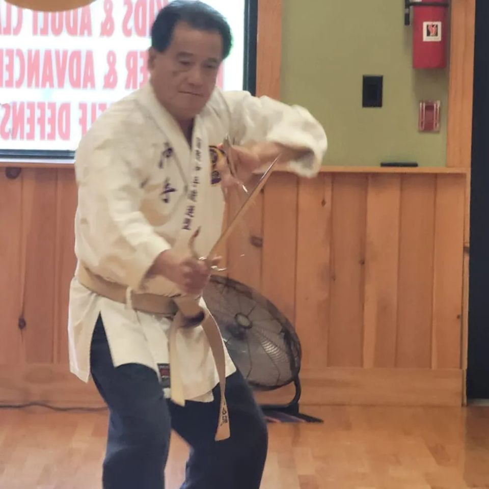 Hanshi Seiken Takamine doing a kata with the Sai weapon